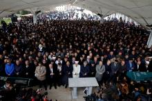 People attend a symbolic funeral prayer for Saudi journalist Jamal Khashoggi at the courtyard of Fatih mosque in Istanbul, Turkey, November 16, 2018. PHOTO BY REUTERS/Huseyin Aldemir