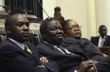 Zimbabwe Vice President Joice Mujuru (R), Prime Minister Morgan Tsvangirai (C) and member of the House of Assembly of Zimbabwe for Kuwadzana Nelson Chamisa attends the presentation of the Final Draft of the Constitution for debate in Parliament Building in Harare, February 6, 2013. PHOTO BY REUTERS/Philimon Bulawayo