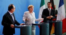 German Chancellor Angela Merkel (C), French President Francois Hollande (L) and Italian Prime Minister Matteo Renzi attend a news conference at the chancellery during discussions on the outcome of the Brexit in Berlin, Germany, June 27, 2016. PHOTO BY REUTERS/Hannibal Hanschke