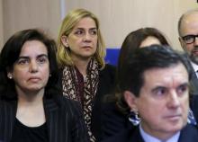 Spain's Princess Cristina (C) sits in court where she appears on charges of tax fraud, as a long-running investigation into the business affairs of her husband goes to trial, in Palma de Mallorca, Spain, January 11, 2016. PHOTO BY REUTERS/Ballesteros