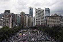 Thousands of pro-democracy protesters gather to march in the streets to demand universal suffrage in Hong Kong
