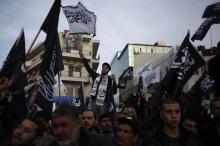 Palestinian supporters of Hizb ut-Tahrir take part in a protest against satirical French weekly newspaper Charlie Hebdo, which featured a cartoon of the Prophet Mohammad on the cover of its first edition since an attack by Islamist gunmen, in the West Bank city of Ramallah, January 24, 2015. PHOTO BY REUTERS/Mohamad Torokman