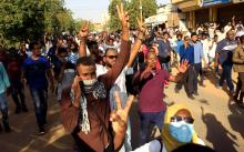 Sudanese demonstrators chant slogans as they march along the street during anti-government protests in Khartoum, Sudan, December 25, 2018. PHOTO BY REUTERS/Mohamed Nureldin Abdallah