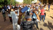 Sudanese demonstrators chant slogans as they march along the street during anti-government protests in Khartoum, Sudan, December 25, 2018. PHOTO BY REUTERS/Mohamed Nureldin Abdallah
