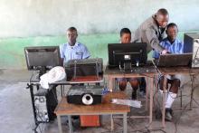Pupils use solar-powered computers at Gomba High School in Gutu, Zimbabwe. PHOTO BY REUTERS/Jonathan Njerere