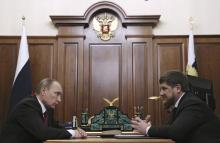 Russian President Vladimir Putin (L) meets with Chechnya's leader Ramzan Kadyrov at the Kremlin in Moscow, Russia, in this December 10, 2015 file photo. PHOTO BY REUTERS/Mikhail Klimentyev