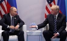 President Donald Trump meets with Russian President Vladimir Putin during the their bilateral meeting at the G20 summit in Hamburg. PHOTO BY REUTERS/Carlos Barria