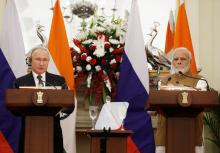 Russian President Vladimir Putin and India's Prime Minister Narendra Modi attend a presentation of a joint statement after their delegation level talks at Hyderabad House in New Delhi, India, October 5, 2018. PHOTO BY REUTERS/Adnan Abidi