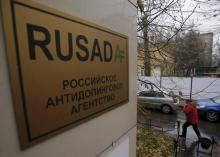 A man walks outside an office of the Russian Anti-Doping Agency (RUSADA) in Moscow, Russia, November 10, 2015. A Moscow laboratory used for doping tests has stopped operating after it was closed by the World Anti-Doping Agency, the head of the Russian Anti-Doping Agency Nikita Kamaev said on Tuesday. PHOTO BY REUTERS/Maxim Shemetov