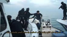A still image taken from a video provided by Bahraini security officials shows Bahraini forces raiding a speedboat manned by Shi’ite militant fugitives it says were heading for Iran from Bahrain’s northeastern coast, February 9, 2017. PHOTO BY REUTERS/Bahraini security officials