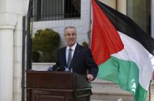 Palestinian Prime Minister Rami Hamdallah talks to media after the first unity government meeting in the West Bank city of Ramallah