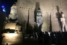 Tourists and Egyptians look at a huge granite statue of King Ramses II (C) after the completion of the restoration work, hours after the Egyptian Ministry of Antiquities revealed the contents of a Pharaonic cemetery on the western bank in Luxor, south of Cairo, Egypt, April 18, 2017. PHOTO BY REUTERS/ Sherif Fahmy