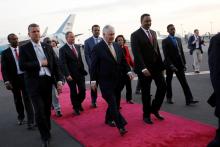 Ethiopia's Minister of Foreign Affairs Workneh Gebeyehu (center R) walks the red carpet with U.S. Secretary of State Rex Tillerson (center L) as he arrives to begin a six-day trip in Africa, landing at Addis Ababa International Airport in Addis Ababa, Ethiopia, March 7, 2018. PHOTO BY REUTERS/Jonathan Ernst