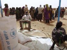 Malian refugees queue for food at the refugee camp of Taberey Baraye, some 7km (4 miles) from Ayorou, near the Mali-Niger border, January 31, 2013. PHOTO BY REUTERS/Alain Amontchi