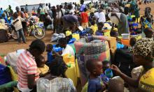 South Sudanese refugee families displaced by fighting gather at Imvepi settlement in Arua district, northern Uganda, April 4, 2017. PHOTO BY REUTERS/James Akena