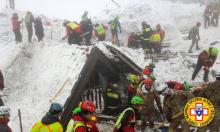 Rescue workers search around the Hotel Rigopiano in Farindola, central Italy, hit by an avalanche, in this undated picture released on January 22, 2017 provided by Alpine and Speleological Rescue Team. PHOTO BY REUTERS