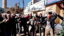 Residents of Nubul and al-Zahraa, along with forces loyal to Syria's President Bashar al-Assad, celebrate after the siege of their towns was broken, northern Aleppo countryside, Syria, in this handout picture provided by SANA, February 4, 2016. PHOTO BY REUTERS/SANA
