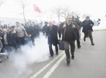 Riot police use tear gas to disperse protesting employees and supporters of Zaman newspaper at the courtyard of the newspaper's office in Istanbul, Turkey, March 5, 2016. PHOTO BY REUTERS/Osman Orsal