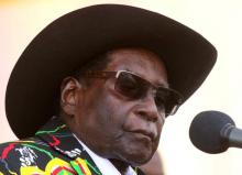 Former President Robert Mugabe addresses supporters of his ruling ZANU (PF) party gathered for a rally in Chinhoyi, Zimbabwe, July 29, 2017. PHOTO BY REUTERS/Philimon Bulawayo