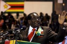 Zimbabwe's President Robert Mugabe gestures while addressing a meeting of veterans of the country's independence war in the capital Harare, April 7, 2016. PHOTO BY REUTERS/Philimon Bulawayo