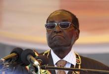 President Robert Mugabe waits to address crowds gathered for Zimbabwe's Heroes Day commemorations in Harare, August 10, 2015. PHOTO BY REUTERS/Philimon Bulawayo