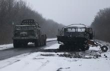 Ukrainian armed forces ride on a multiple rocket launcher system near Debaltseve, eastern Ukraine, February 16, 2015. PHOTO BY REUTERS/Gleb Garanich