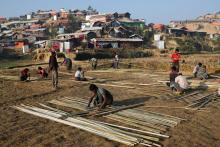 Rohingya refugees build shelter with bamboo at the Jamtoli camp in the morning in Cox's Bazar, Bangladesh, January 22, 2018. PHOTO BY REUTERS/Mohammad Ponir Hossain
