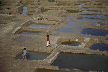 Rohingya refugee children play outside the Shamlapur refugee camp near Cox's Bazar, Bangladesh, December 20, 2017. PHOTO BY REUTERS/Marko Djurica