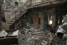 Rubble lies in a damaged building near Aleppo's historic citadel, which is controlled by forces loyal to Syria's President Bashar al-Assad