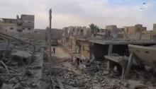 A still image taken from a video released on the internet by Islamic State-affiliated Amaq News Agency, on April 18, 2017, purports to show the aftermath, said to be in al-Bukamal town, in Deir al-Zor province, after air strikes thought to have been directed by planes from a U.S.-led military coalition, Syria. PHOTO BY REUTERS/Social Media Website