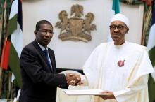 Nigeria's President Muhammadu Buhari greets Senegal's Ambassador to Nigeria Baboucar Sambe at the Presidential Villa in Abuja, Nigeria, January 11, 2017. PHOTO BY REUTERS/ Stringer