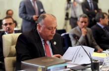 Egyptian Foreign Minister Sameh Shukri looks over a document during a meeting of Arab foreign ministers in Sharm el Sheik. PHOTO BY REUTERS/Thomas Hartwell