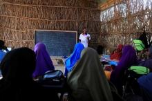 Zeinab's English teacher Abdiweli Mohammed Hersi teaches children at the school near a camp for internally displaced people from drought hit areas in Dollow, Somalia, April 3, 2017. PHOTO BY REUTERS/Zohra Bensemra