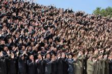 North Korean scientists and technicians, who developed missile "Hwasong-12" cheer North Korean leader Kim Jong Un in this undated photo released by North Korea's Korean Central News Agency (KCNA), May 20, 2017. PHOTO BY REUTERS/KCNA