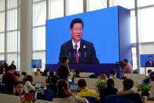 Reporters at media centre of Boao Forum for Asia watch Chinese President Xi Jinping delivering his speech at the annual forum, in Boao, in the southern Chinese province of Hainan, China, April 10, 2018. PHOTO BY REUTERS/Joseph Campbell
