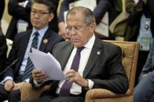 Russia's Foreign Minister Sergei Lavrov looks over a paper during the 22nd Association of Southeast Asian Nations (ASEAN) Regional Forum session at the Putra World Trade Center in Kuala Lumpur, Malaysia, August 6, 2015. PHOTO BY REUTERS/Brendan Smialowski