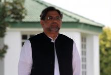 Pakistan's Prime Minister Shahid Khaqan Abbasi reviews the honour guard in Islamabad, Pakistan, August 3, 2017. PHOTO BY REUTERS/Caren Firouz