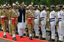 Pakistan's Prime Minister Shahid Khaqan Abbasi reviews the honour guard in Islamabad, Pakistan, August 3, 2017. PHOTO BY REUTERS/Caren Firouz