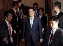 Japanese Prime Minister Shinzo Abe leaves a meeting with Chinese President Xi Jinping on the sidelines of the Asian-African Conference in Jakarta April 22, 2015. REUTERS/Darren Whiteside