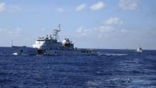 Chinese coastguard ships give chase to Vietnamese coastguard vessels (not pictured) after they came within 10 nautical miles of the Haiyang Shiyou 981, known in Vietnam as HD-981, oil rig in the South China Sea