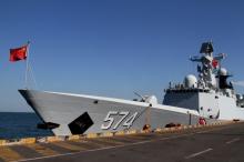 A Chinese navy ship is seen docked after an exercise with Cambodian naval officers in Preah Sihanouk province, Cambodia, February 26, 2016. PHOTO BY REUTERS/Samrang Pring