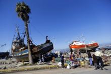Ships are seen on the street after an earthquake hit areas of central Chile, in Coquimbo city, north of Santiago, Chile, September 17, 2015. PHOTO BY REUTERS/Ivan Alvarado