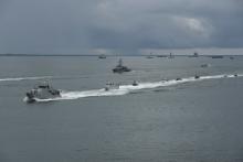 Indonesia navy ships take part in a parade during the launch of coordinated patrols to beef up security between Malaysia, Indonesia, and Philippine off the Tarakan sea, in Tarakan, Indonesia, June 19, 2017. PHOTO BY REUTERS/Antara Foto/Zabur Karuru