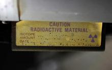 A sign indicating radioactive material is shown in Anaheim, California, March 17, 2011. PHOTO BY REUTERS/Lucy Nicholson