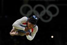 Simone Biles of the U.S. competes on her way to gold in the vault during the women's individual all-around final. PHOTO BY REUTERS/Dylan Martinez