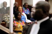 Ivory Coast's former first lady Simone Gbagbo (L) looks on as she attends the first day of her trial at the Palace of Justice in Abidjan, December 26, 2014. PHOTO BY REUTERS/Luc Gnago