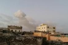 Smoke rises after car bombs explode in Mogadishu, Somalia February 23, 2018 in this still image taken from social media video. PHOTO BY REUTERS/Universal TV