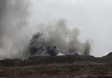 Smoke billows from the site of a Saudi-led air strike in Yemen's capital Sanaa, July 2, 2015. PHOTO BY REUTERS/Khaled Abdullah