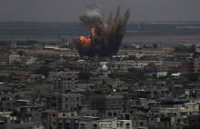 Smoke and flames are seen following what police said was an Israeli air strike in Rafah in the southern Gaza Strip