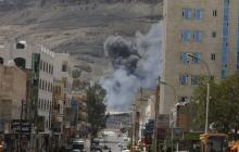 Smoke rises from the site of a Saudi-led air strike in Yemen's capital Sanaa September 18, 2015. PHOTO BY REUTERS/Khaled Abdullah